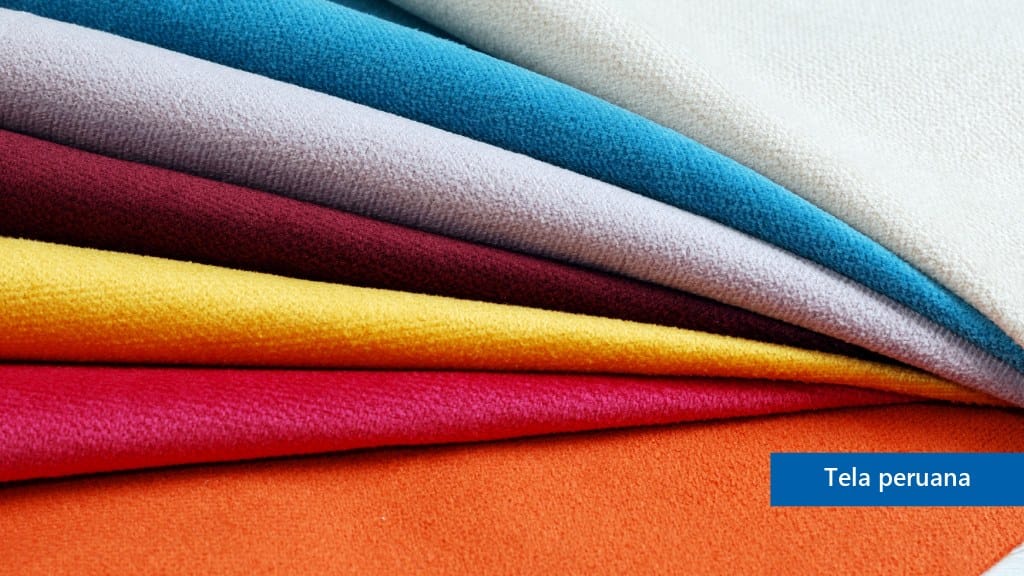 Telas peruanas de punto dobladas en varios colores para confección